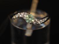 Серебряное кольцо с бериллом 0.18 карат и фианитами - 269